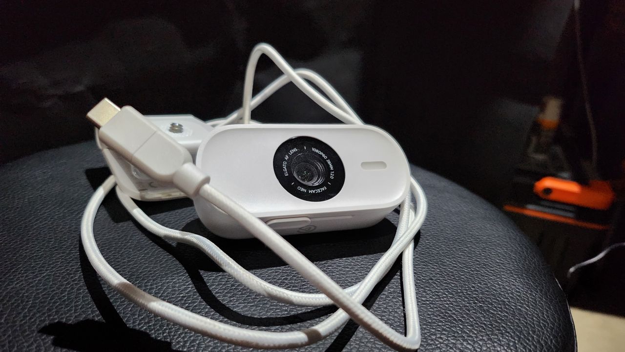 Elgato Facecam Neo set up on a desk.