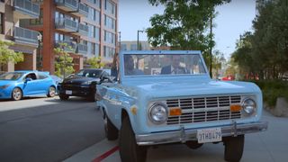 A blue car parking during the Apple TV Plus show, Shrinking.