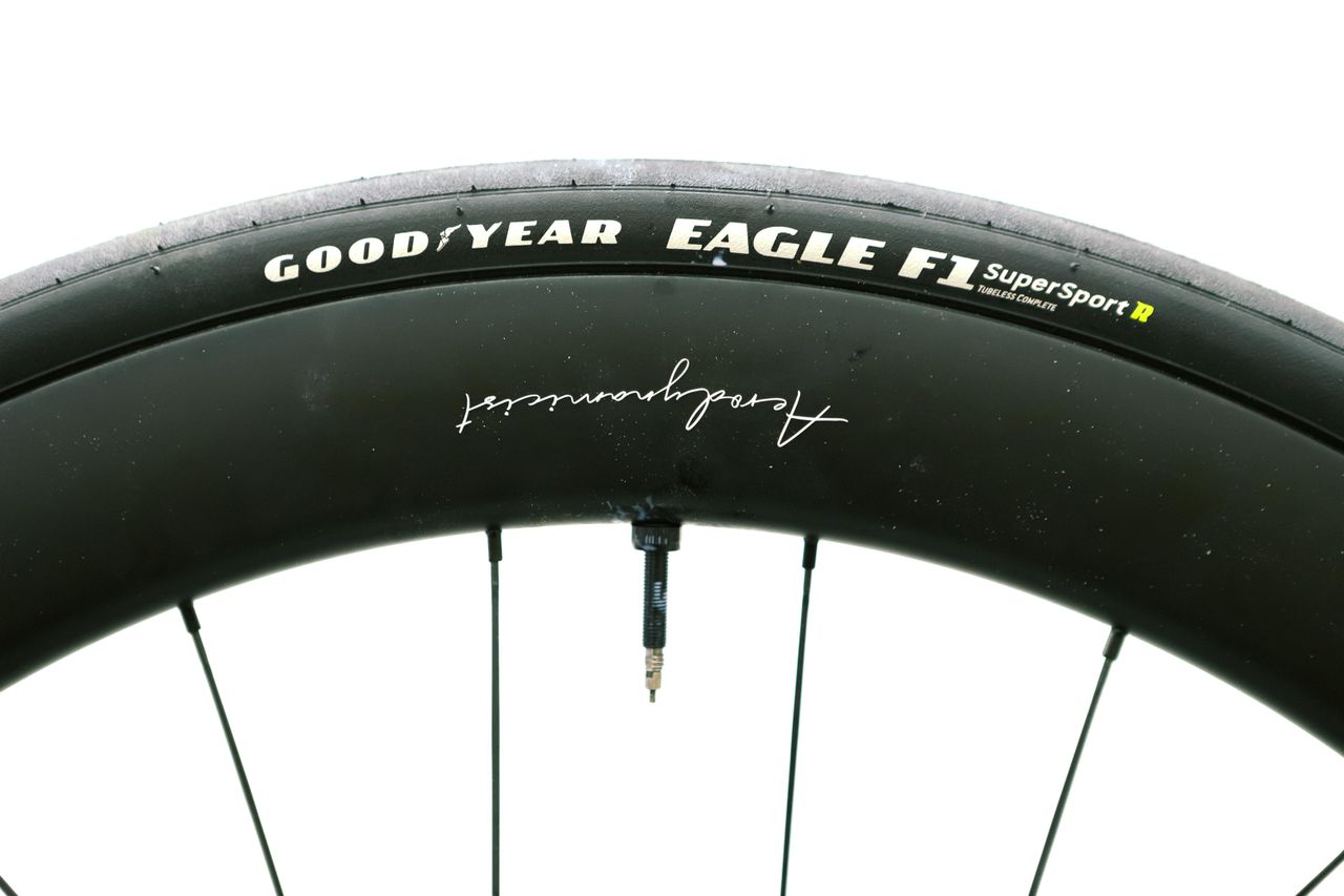 a close up of a black road bike tyre