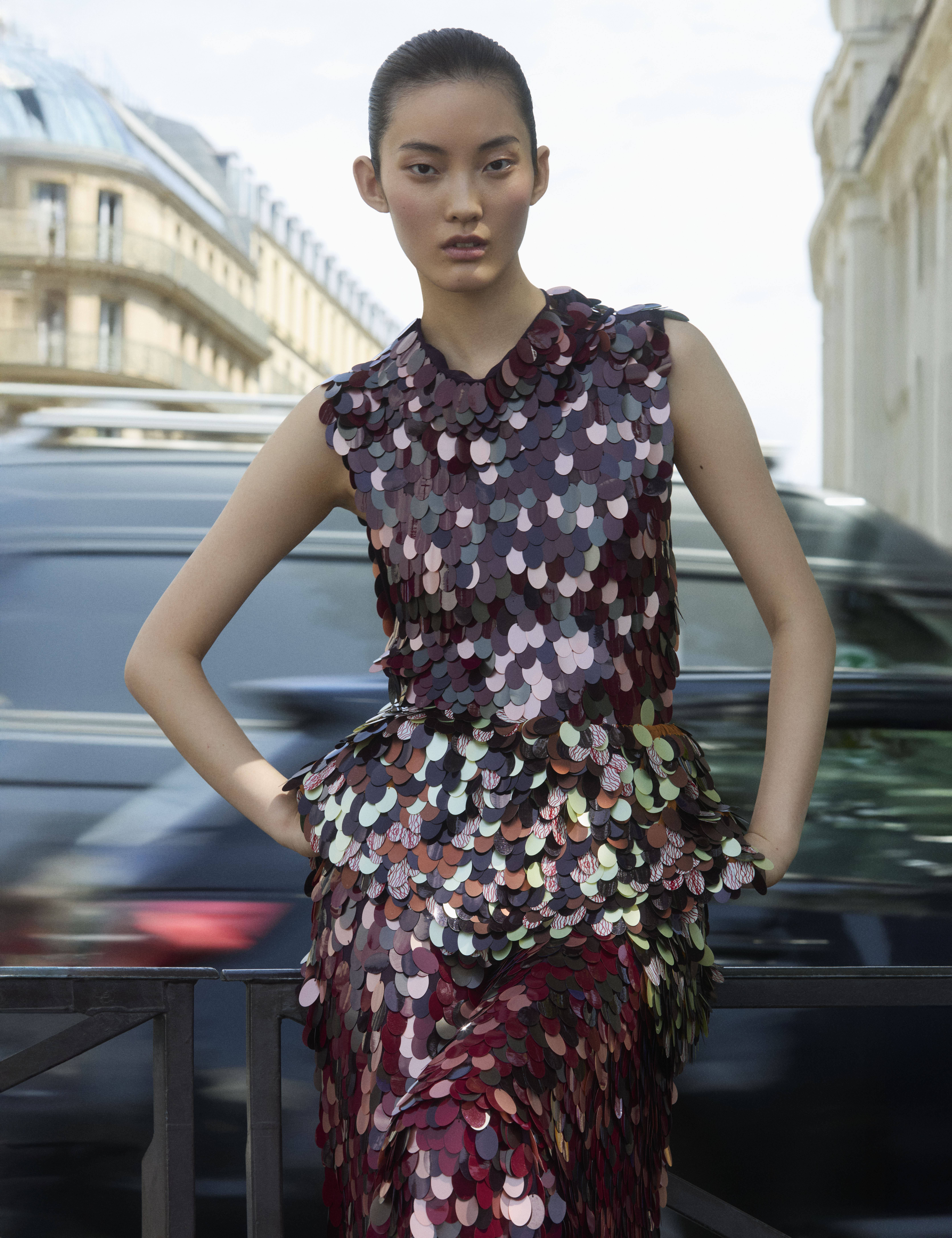 a model on the streets of paris wearing designs from the autumn/winter 2025 collections