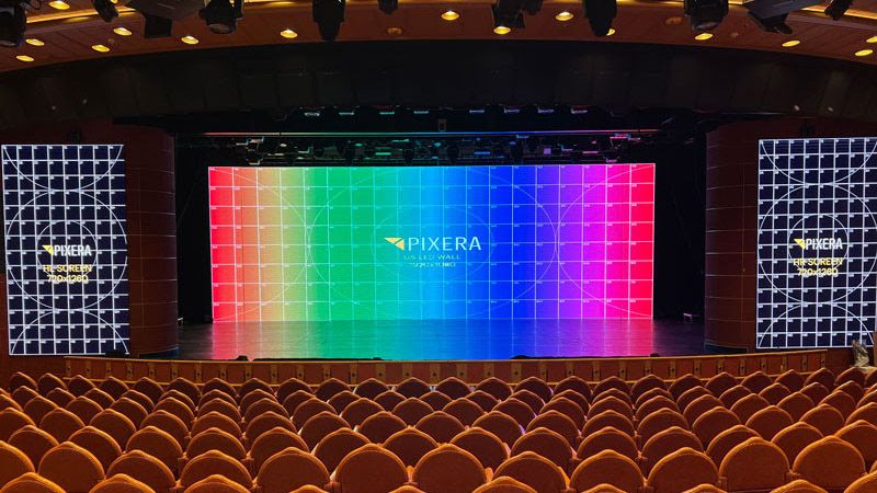 A massive PIXERA LED show of rainbow colors on a Carnival Cruise Line. 
