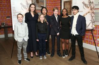 NEW YORK, NEW YORK - FEBRUARY 25: Angelina Jolie with children Knox Leon Jolie-Pitt, Vivienne Marcheline Jolie-Pitt, Pax Thien Jolie-Pitt, Shiloh Nouvel Jolie-Pitt, Zahara Marley Jolie-Pitt and Maddox Chivan Jolie-Pitt attend "The Boy Who Harnessed The Wind" Special Screening at Crosby Street Hotel on February 25, 2019 in New York City. (Photo by Monica Schipper/Getty Images for Netflix)
