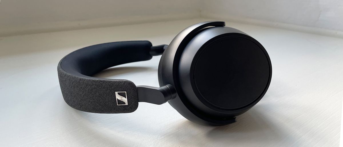 Sennheiser Momentum 4 Wireless in black placed on a window seat at reviewer&#039;s home