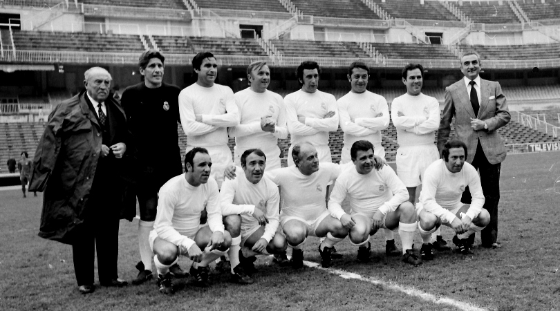 Real Madrid players pose with president Santiago Bernabeu after winning their fifth European Cup in May 1960.