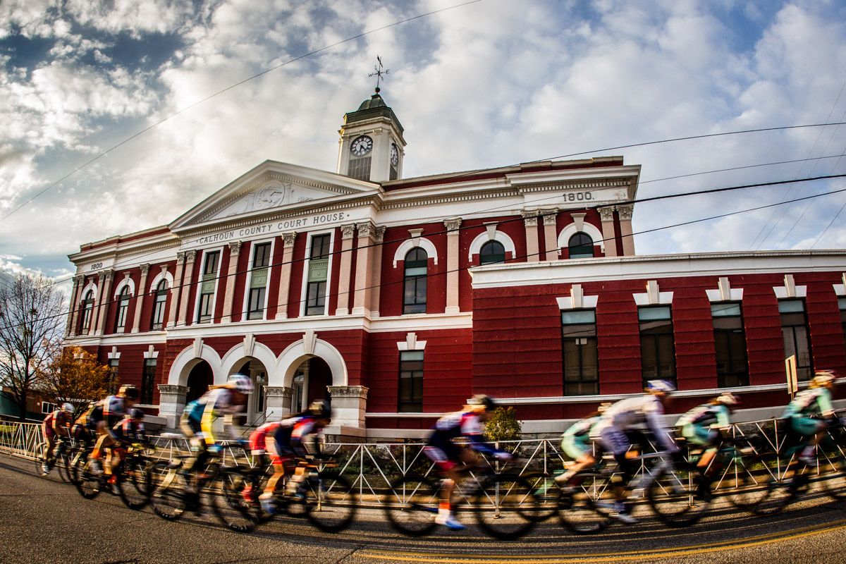 The women race past the county courthouse
