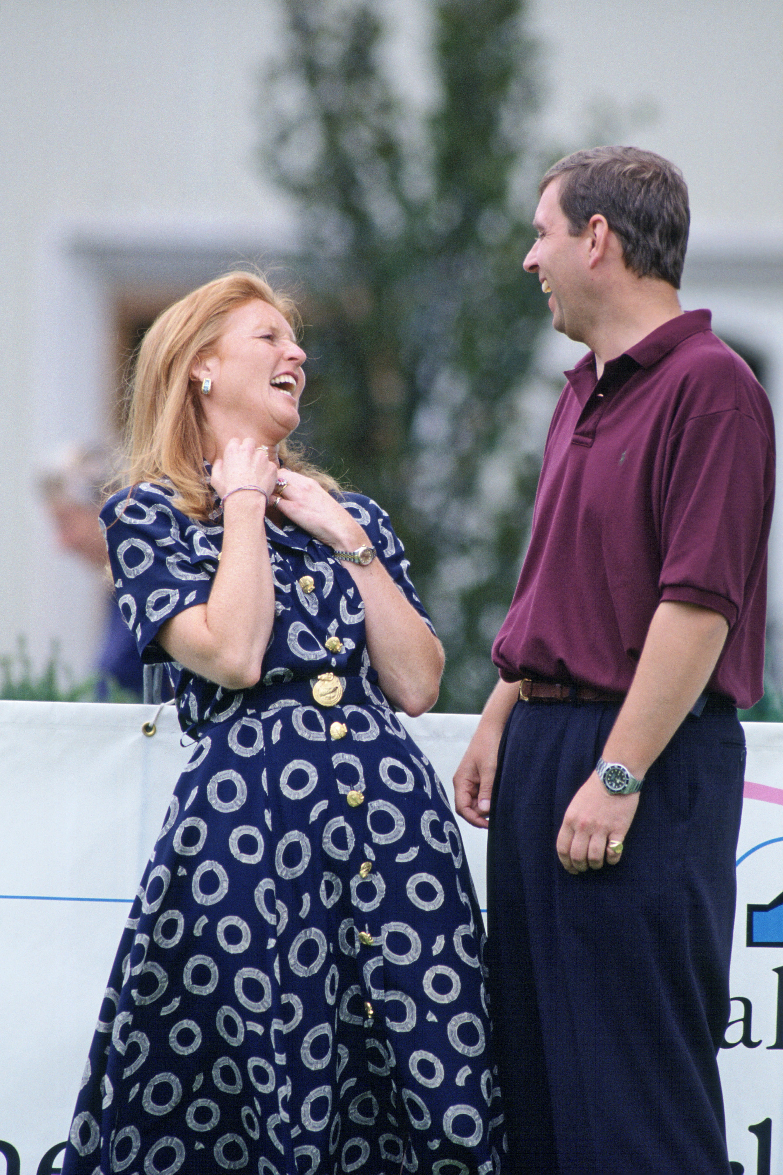 Sarah Ferguson laughing standing next to Prince Andrew