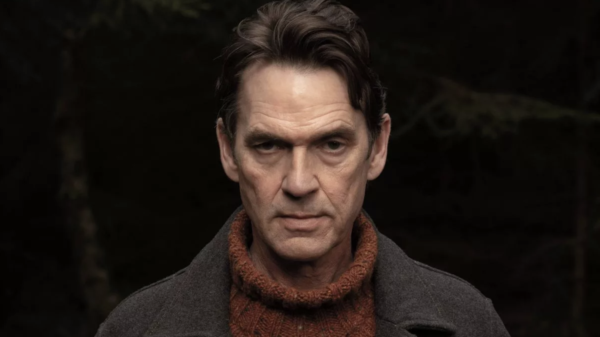 Dougray Scott, wearing a brown wool turtleneck, in Channel 4 thriller Summerwater – a six part series based on the Sarah Moss novel