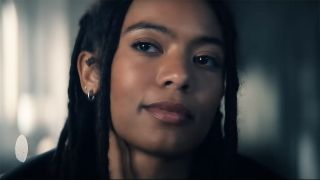 A close up of Marie looking at an off-camera Cipher in Gen V season 2