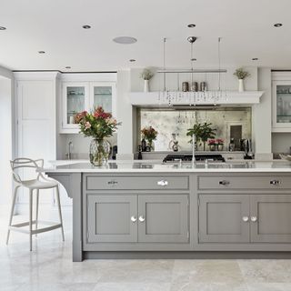 kitchen room with grey tiled flooring and kitchen countertop