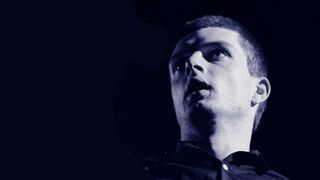 Ian Curtis onstage