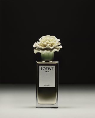 Loewe 001 perfume with a Lladró bottle top