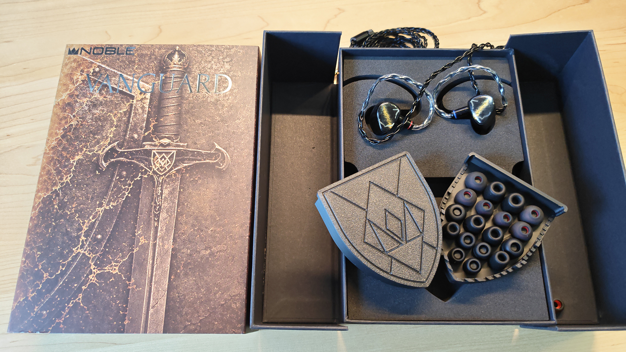 The Noble Vanguard IEMs in various positions in my home office.