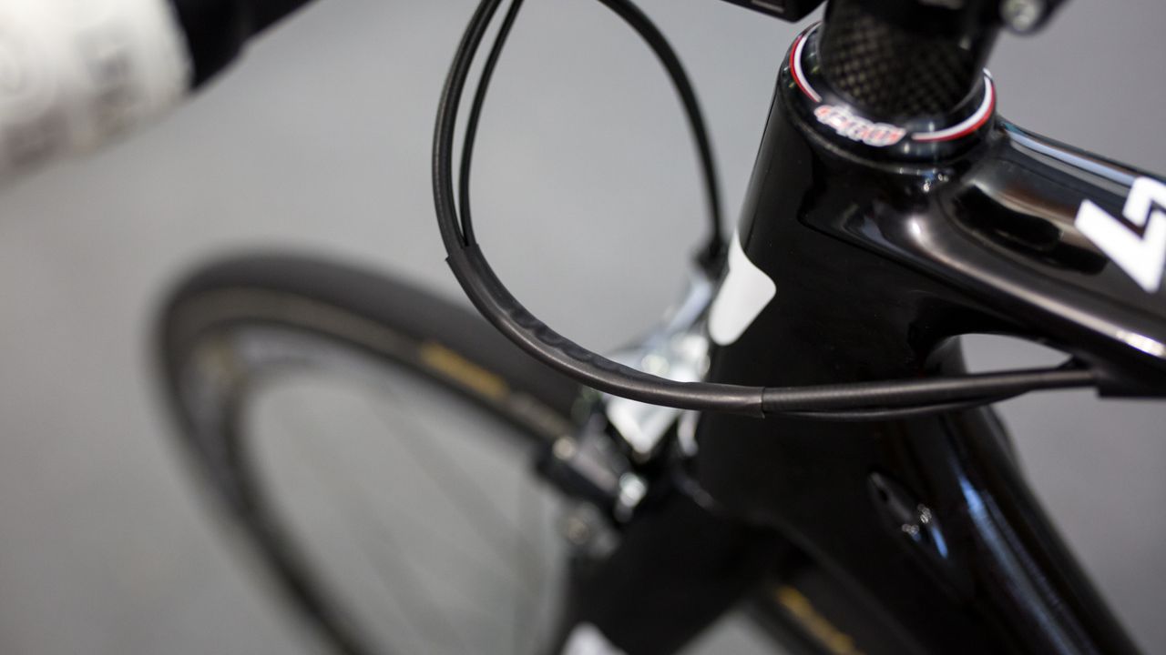 Shrink wrap keeps the brake and gear cables tidy