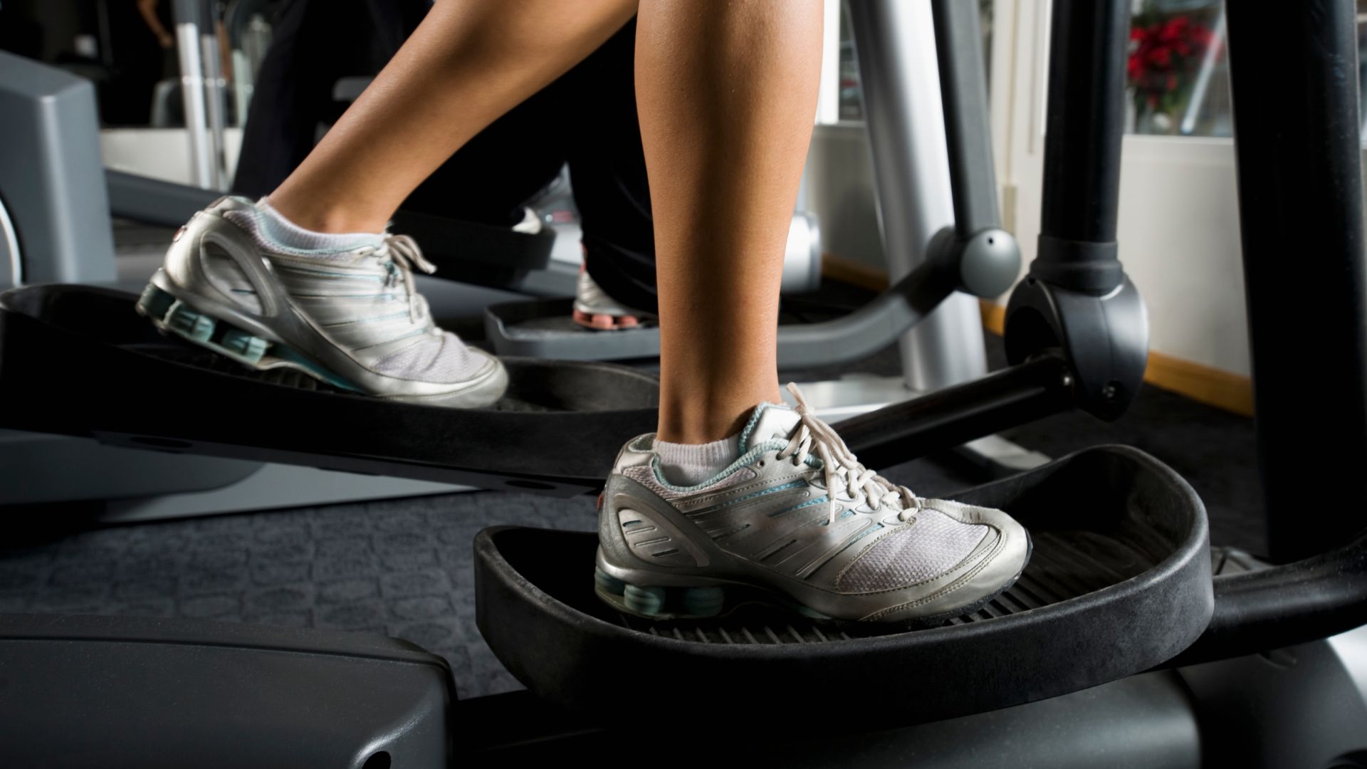 Woman's feet using a cross trainer