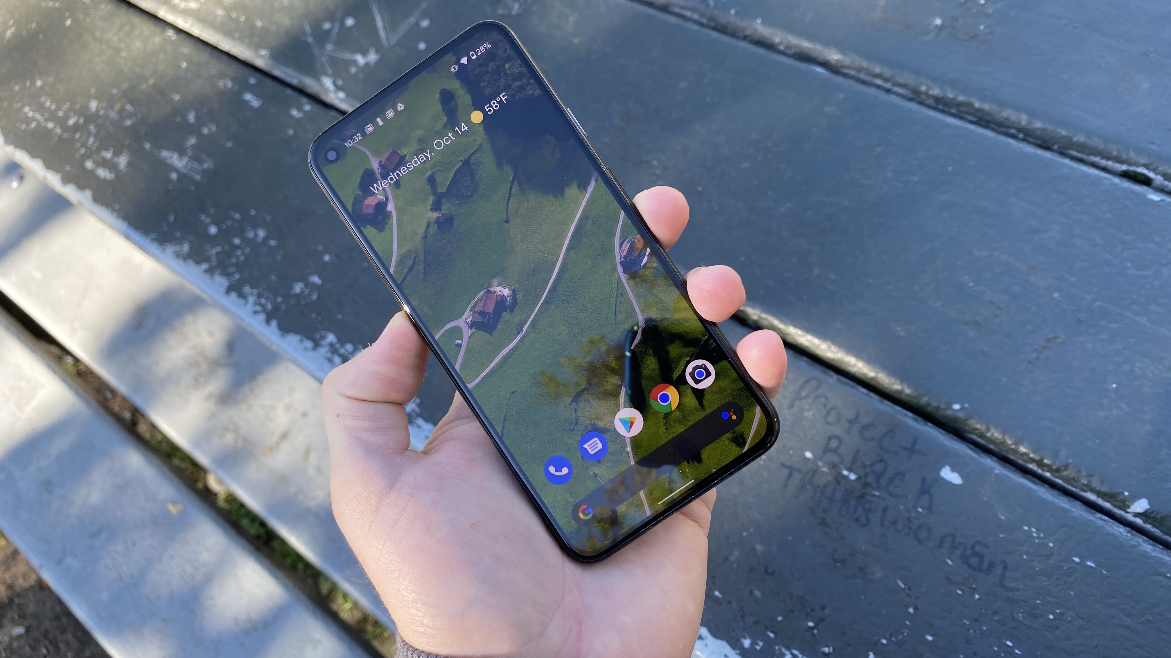 A Google Pixel 5 held in someone's hand