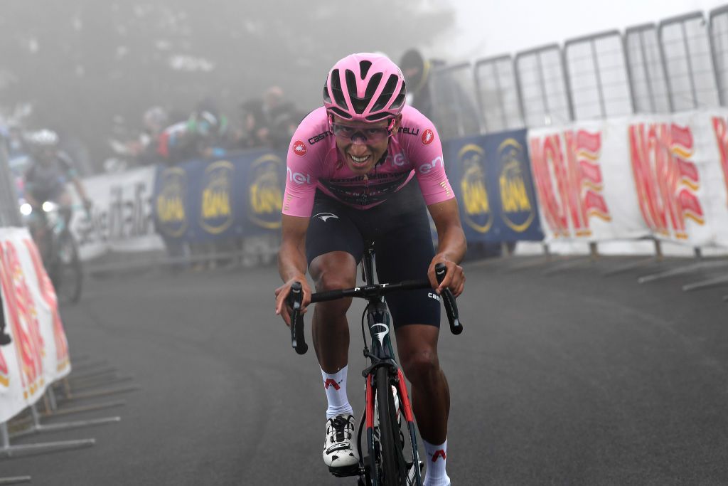 MONTE ZONCOLAN ITALY MAY 22 Egan Arley Bernal Gomez of Colombia and Team INEOS Grenadiers Pink Leader Jersey at Monte Zoncolan 1730m during the 104th Giro dItalia 2021 Stage 14 a 205km stage from Cittadella to Monte Zoncolan 1730m Fog UCIworldtour girodiitalia Giro on May 22 2021 in Monte Zoncolan Italy Photo by Tim de WaeleGetty Images