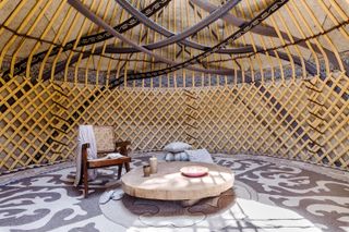 Inside of yourta yurt with interiors and textiles handmade in Kyrgyzstan