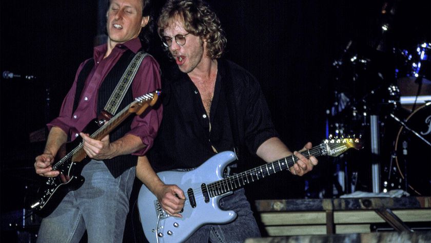 Warren Zevon performing with his all-gray Modulus Blackknife in 1987.