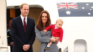 Prince William, Kate Middleton and Prince George board a plane, 2014