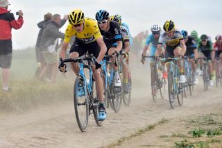Chris Froome and Geraint Thomas ride the cobbles.