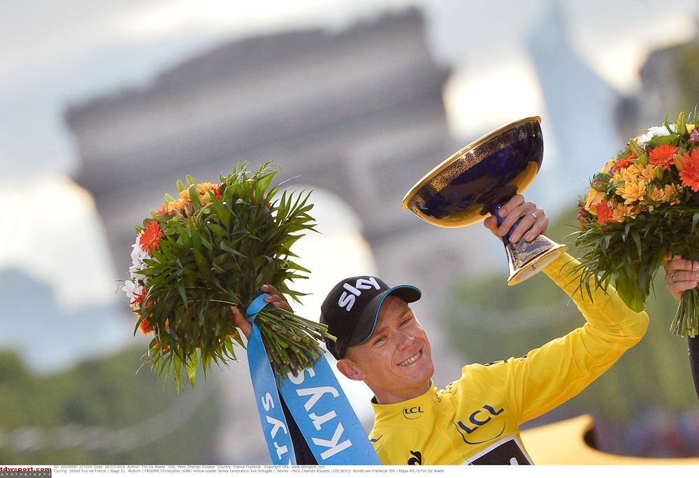 Chris Froome with his 2015 Tour de France trophy.