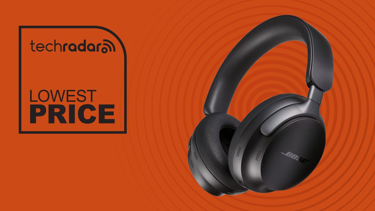 Bose QuietComfort Ultra headphones in black on orange background with TechRadar &quot;lowest price&quot; text