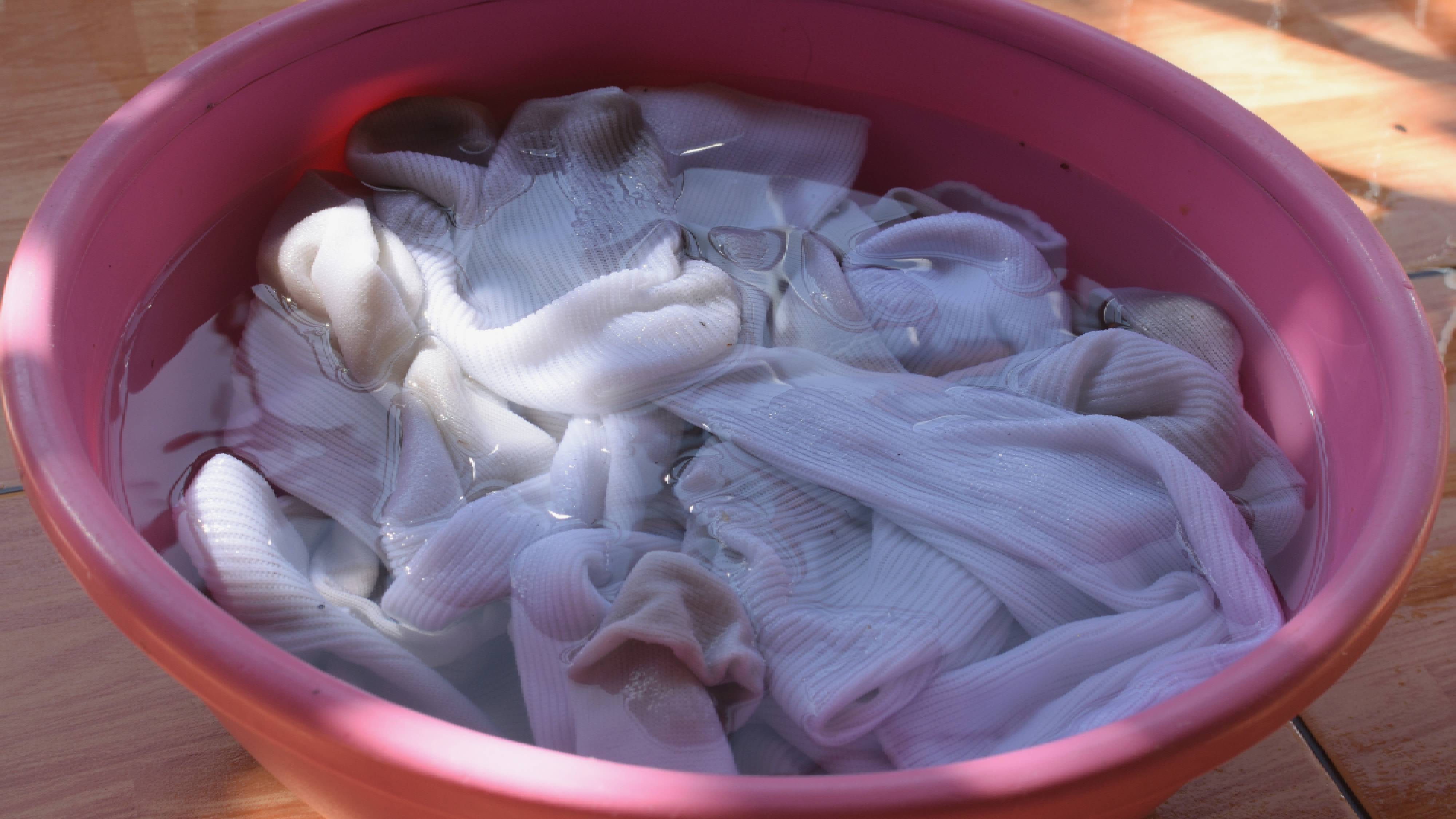 White socks being pre-treated 