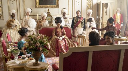 Simone Ashley as Kate Sharma, Golda Rosheuvel as Queen Charlotte, Jonathan Bailey as Anthony Bridgerton, Hugh Sachs as Brimsley, Charithra Chandran as Edwina Sharma, Adjoa Andoh as Lady Danbury in episode 205 of Bridgerton