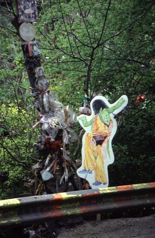 Site where Marc Bolan died when his car crashed into the tree in Queens Ride Barnes in London Tree is decorated by fans