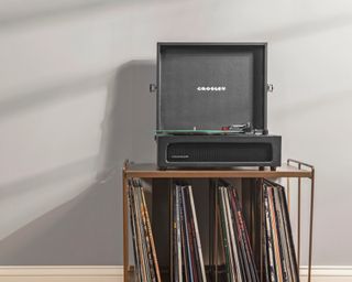 Crosley Voyager in black on record storage cart