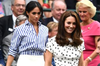 Kate Middleton Meghan Markle on day twelve of the Wimbledon Lawn Tennis Championships at All England Lawn Tennis and Croquet Club on July 14, 2018 in London, England.