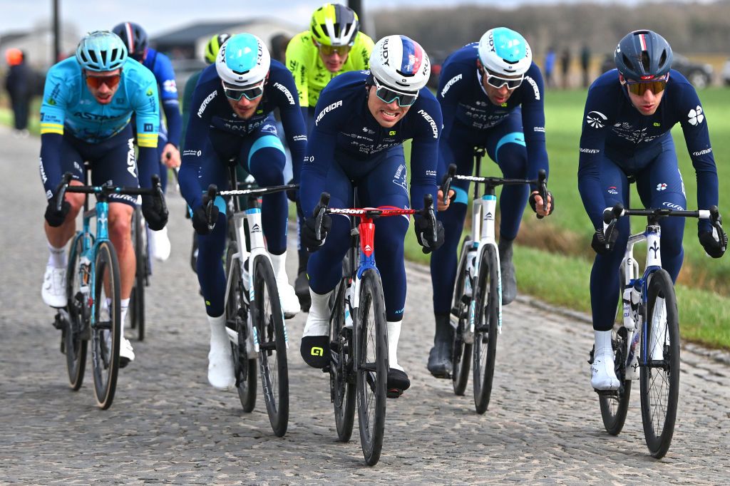 NINOVE BELGIUM FEBRUARY 24 LR Dusan Rajovic of Serbia and Team Bahrain Victorious and Sven Erik Bystrom of Norway and Team GroupamaFDJ compete during the 79th Omloop Het Nieuwsblad 2024 Mens Elite a 2022km one day race from Ghent to Ninove UCIWT on February 24 2024 in Ninove Belgium Photo by Luc ClaessenGetty Images