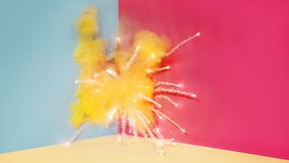 yellow color explosion on blue, pink and yellow colored background