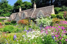 English Country Cottage with beautiful flowers