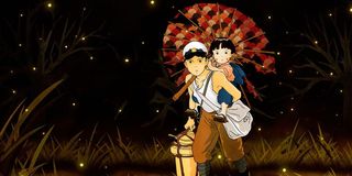 Seita and Setsuko walking at night in Grave of the Fireflies