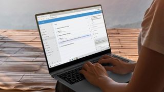 Person using Galaxy Book 5 Pro 360 outside