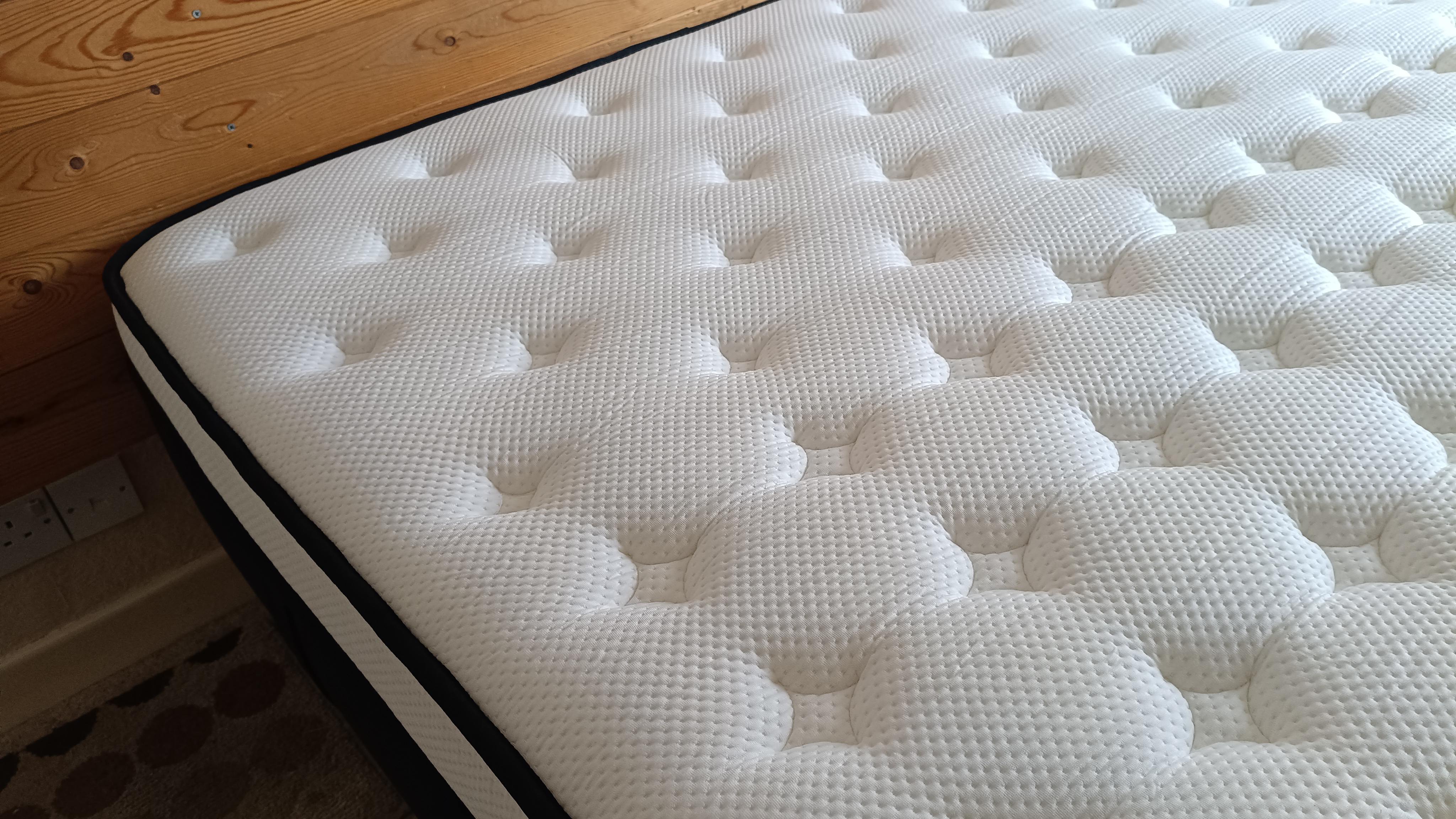 The high-quality CloudPlush&amp;trade; quilted top is shown from a high angle, emphasizing the deep, comfortable tufting pattern.