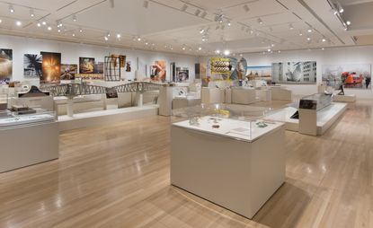 An installation view of the exhibition; showing a plethora of models, mock ups and experimental elements