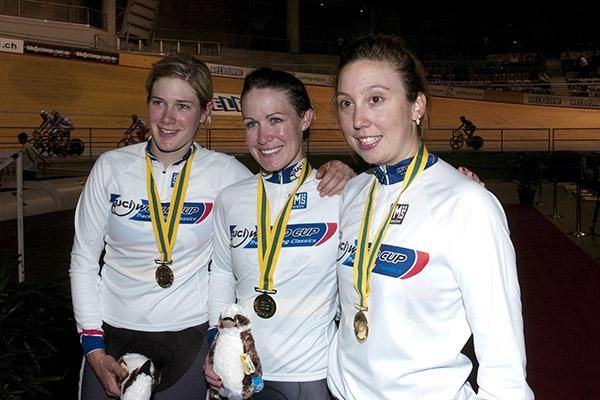 The Australian team pursuiters pose with their gold medals.