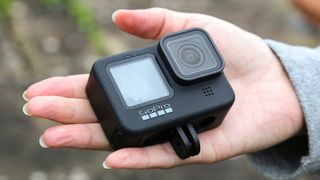 GoPro Hero 9 Black being held in the palm of our reviewer's hand