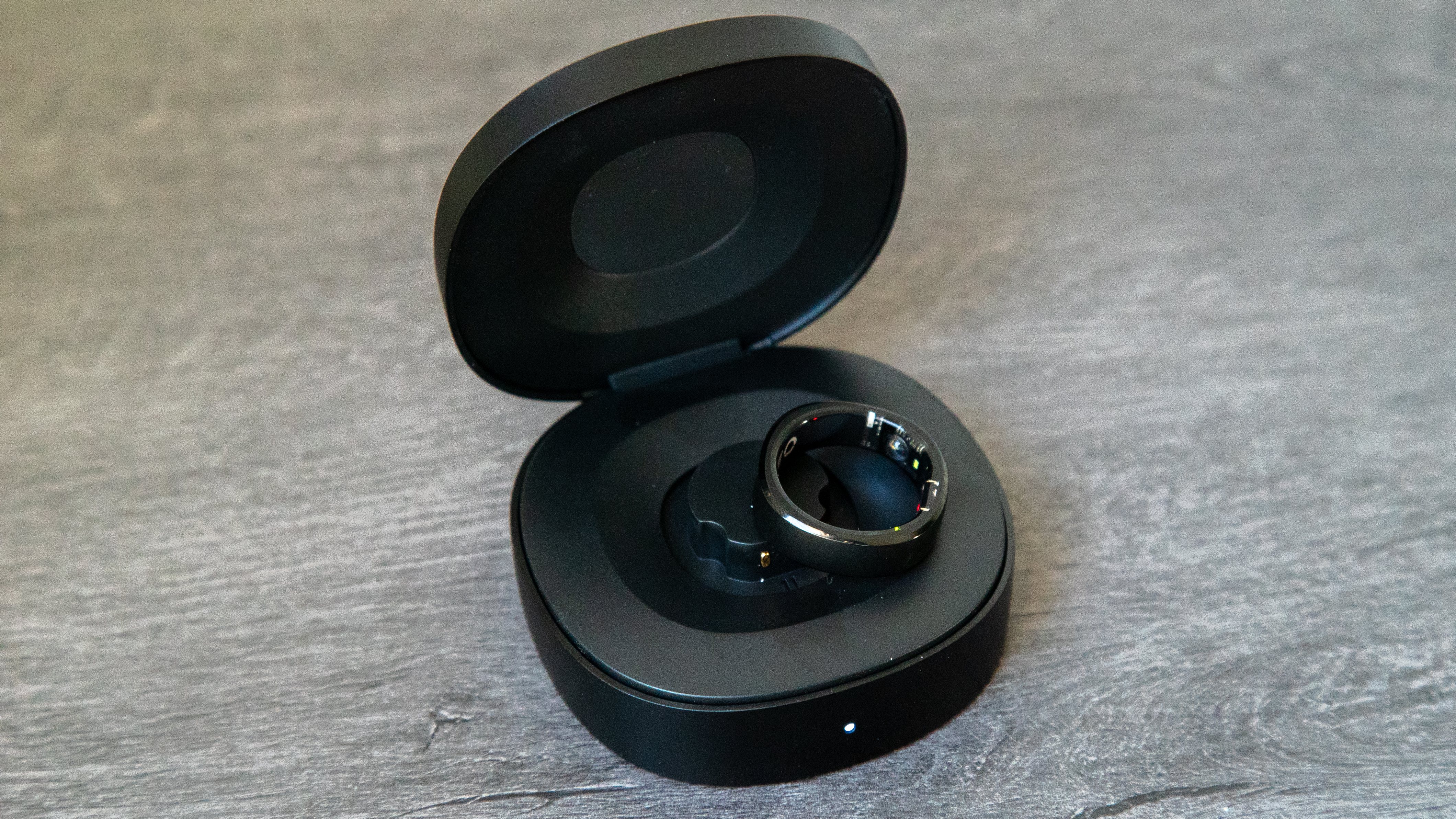 RingConn Smart Ring in the charging cradle