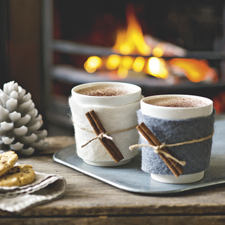 curl up with hot drink and wooden table