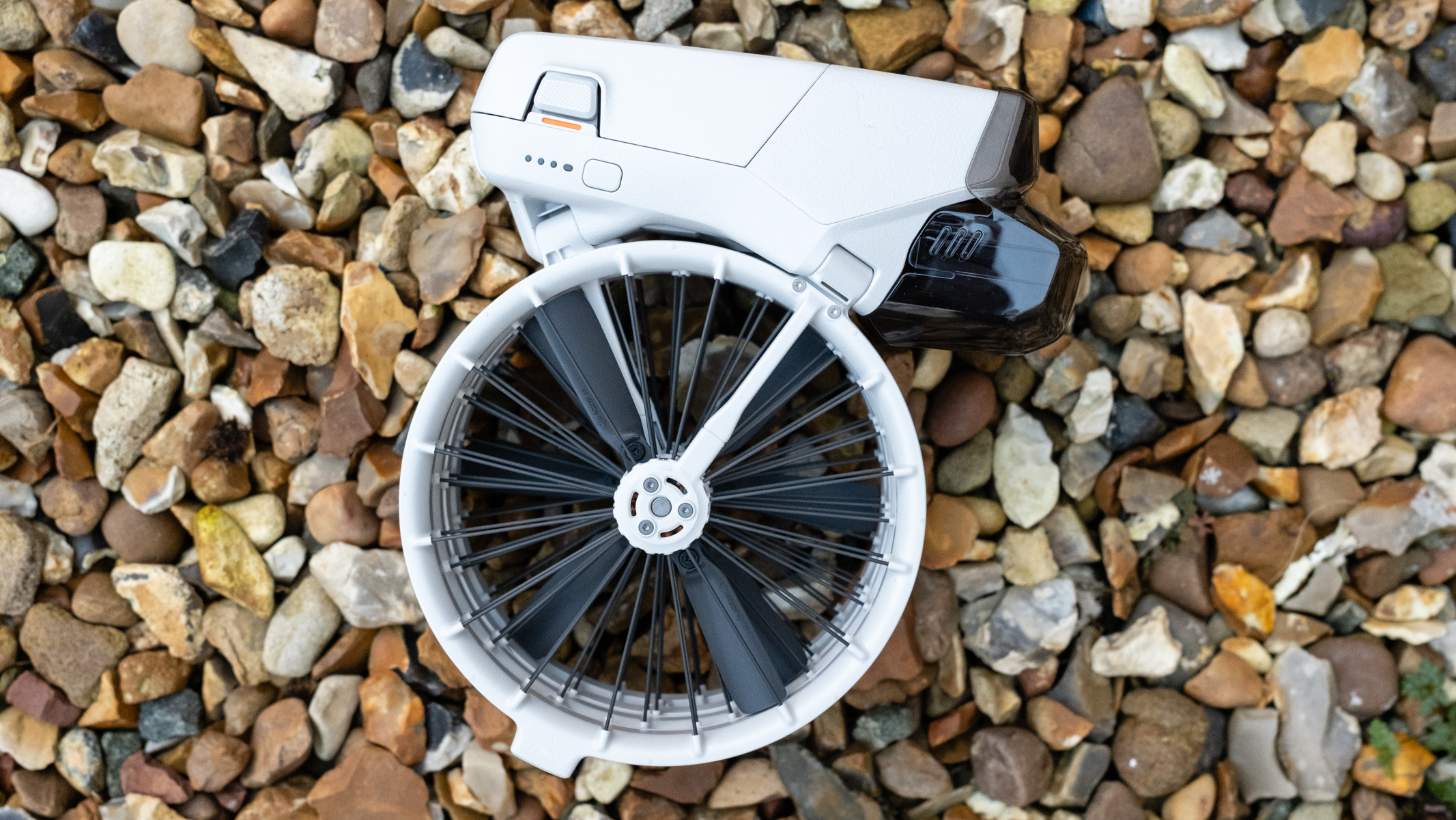 DJI Flip folded on gravel