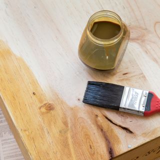 Paint brush and wood varnish