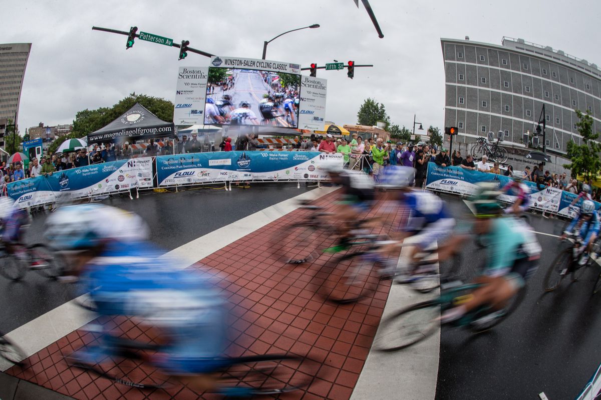 The women get going on the rain-slicked course.