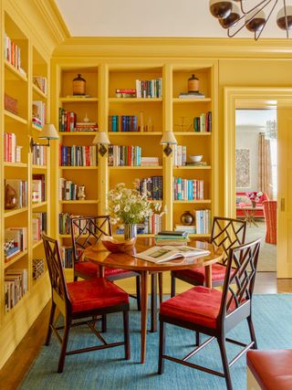 Yellow bookshelf and walls