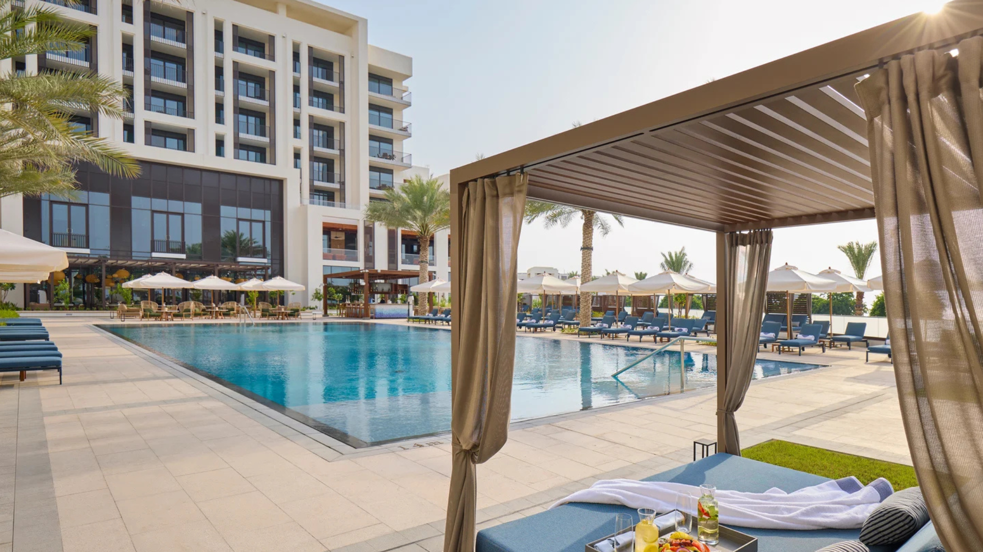 Mandarin Oriental Muscat pool with daybed.