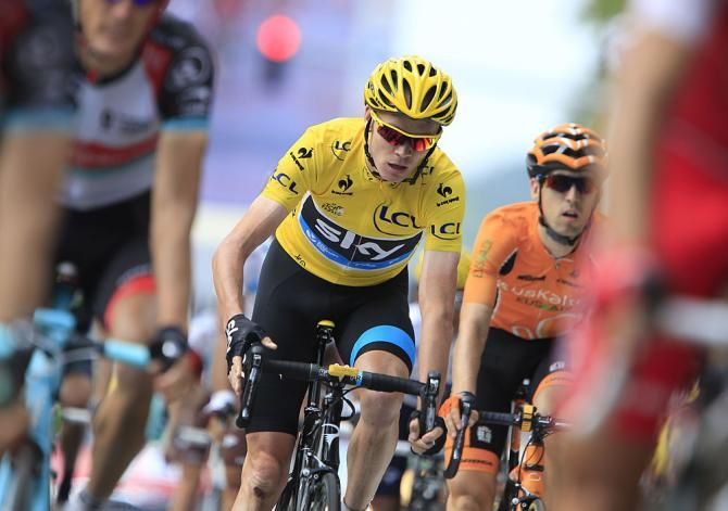 Chris Froome (Sky) racing in yellow during stage 9
