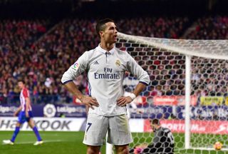 Cristiano Ronaldo celebrates after scoring a hat-trick for Real Madrid against Atletico Madrid in November 2016.