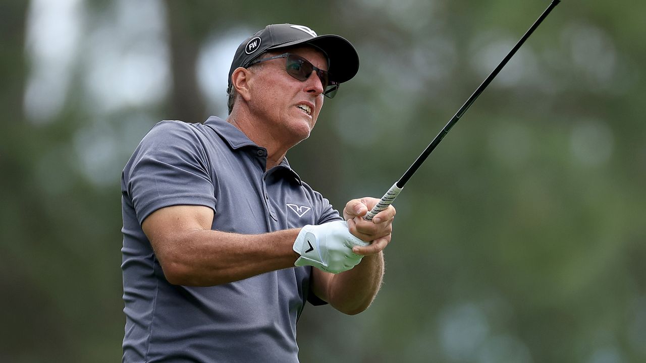 Phil Mickelson takes a shot during the first round of The Masters